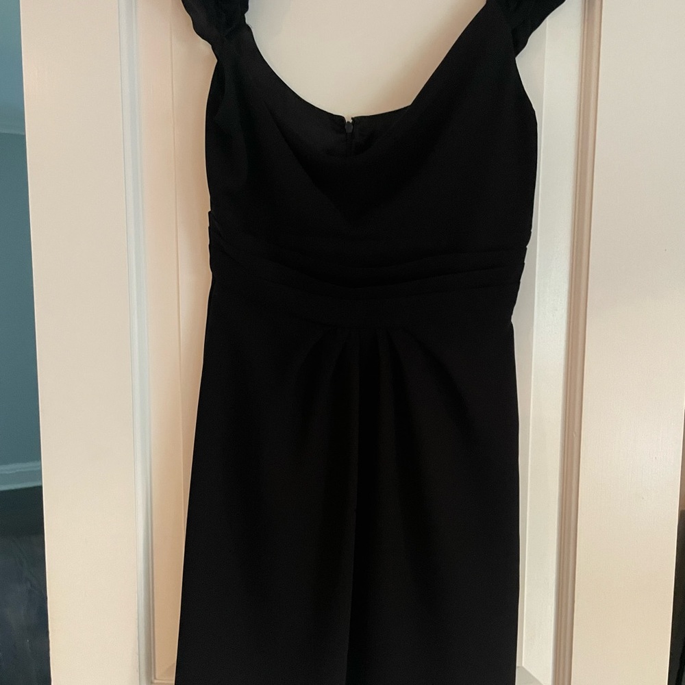 ABS mini black cocktail dress in excellent condition.